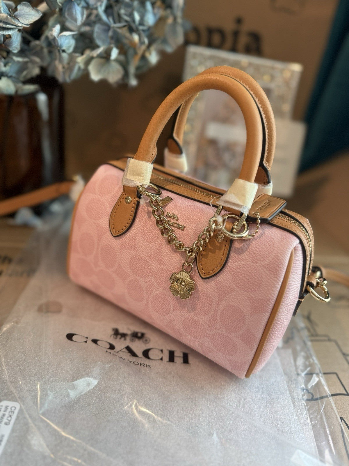 Coach Mini Rowan Bag In Signature With Charms in Powder Pink CEK79 NWT